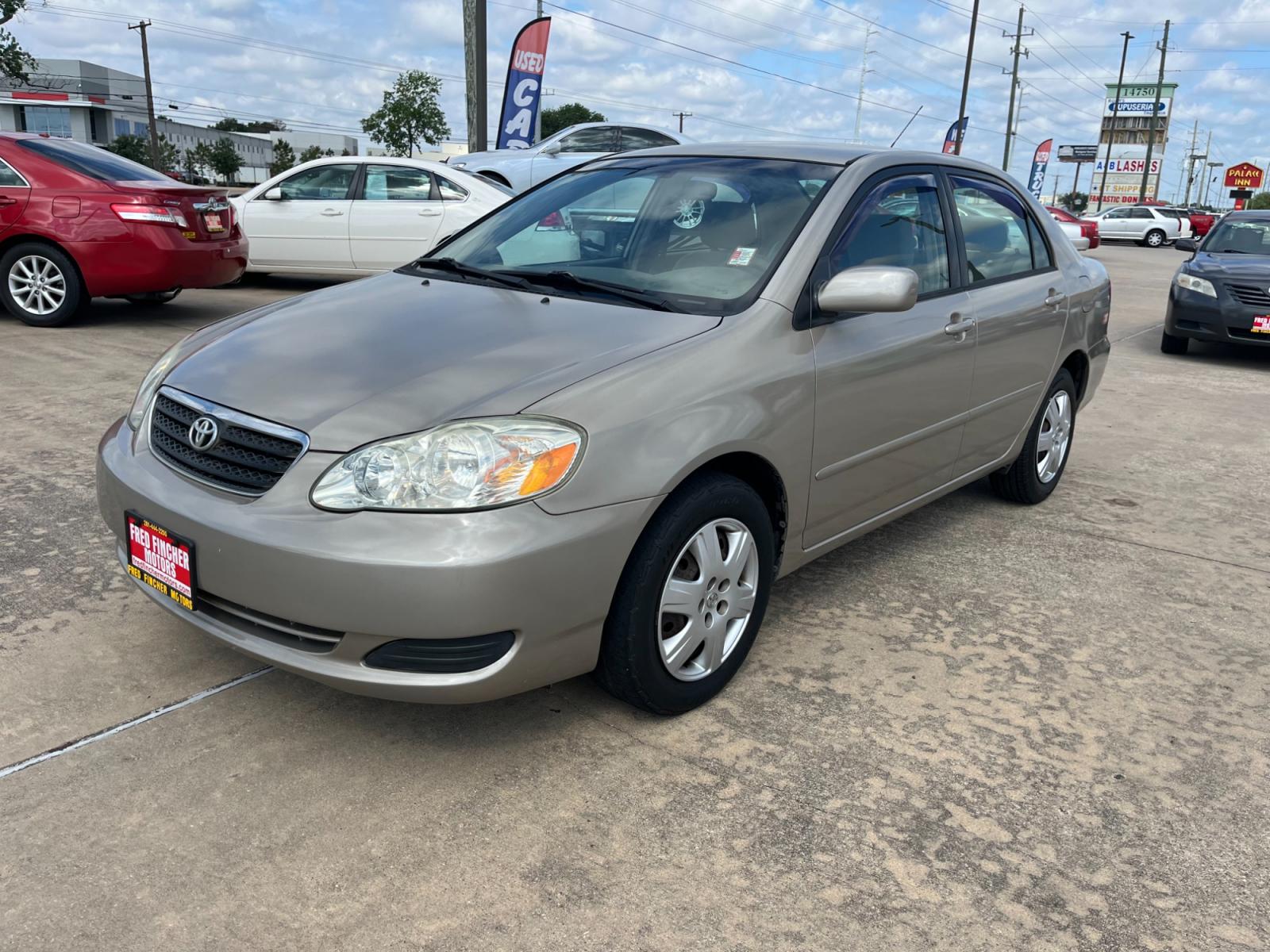 2005 GOLD /TAN Toyota Corolla CE (1NXBR32E75Z) with an 1.8L L4 DOHC 16V engine, Automatic transmission, located at 14700 Tomball Parkway 249, Houston, TX, 77086, (281) 444-2200, 29.928619, -95.504074 - Photo #2